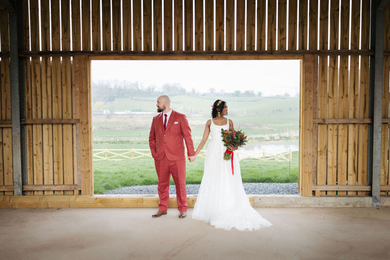 Bride and Groom in a barn